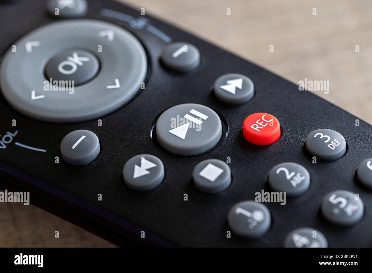 A close up portrait of a remote control to operate a surround sound