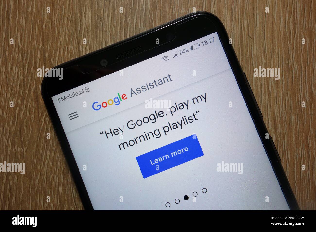 Google Assistant website displayed on smartphone Stock Photo