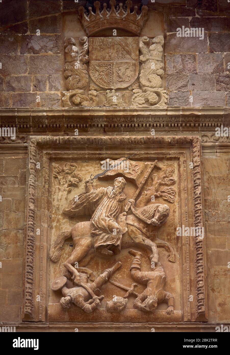 Spain, La Rioja, San Millan de la Cogolla. Yuso Monastery. Relief of Saint Emilian the Moor-Slayer by Spanish sculptor Diego Lizarraga, 1661-1665. Baroque portico, detail. Stock Photo