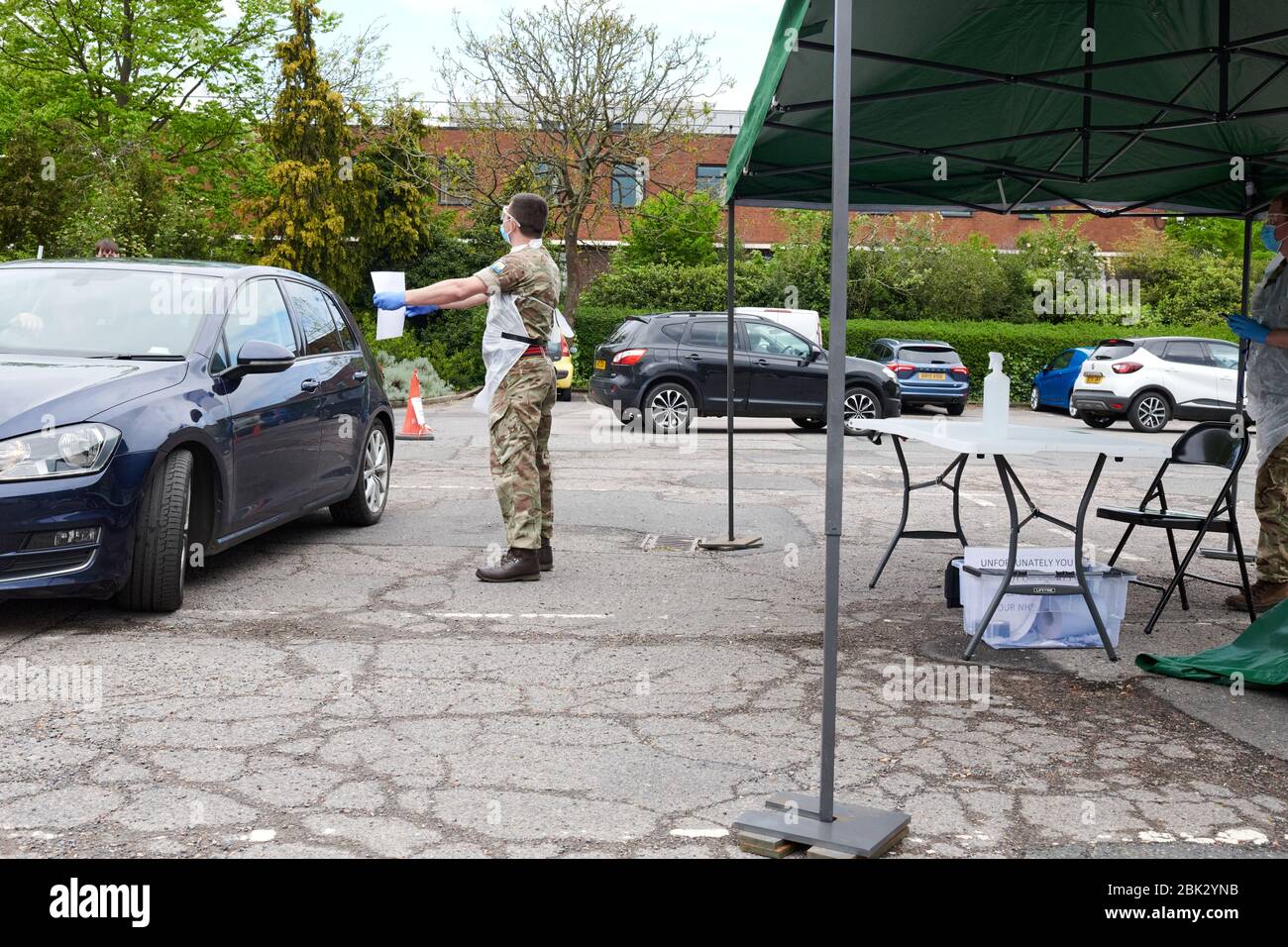 Covid-19 Coronavirus mobile pop-up drive by testing facility in Rugby car park, Warwickshire, UK manned by the British Army for the NHS Stock Photo
