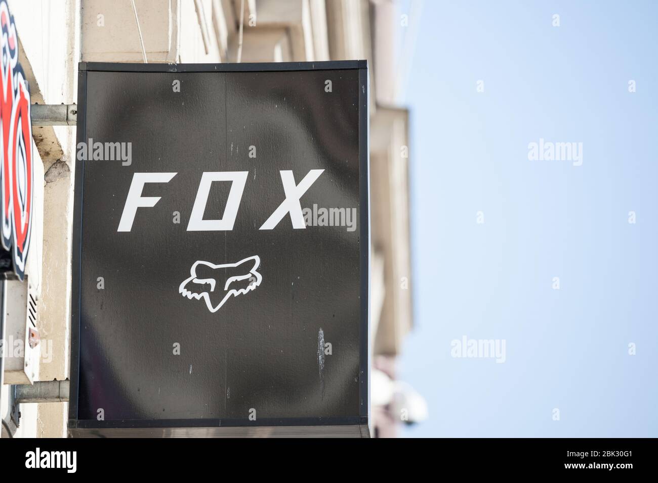 PRAGUE, CZECHIA - OCTOBER 31, 2019: Fox Racing logo in front of their store for Prague. Fox Racing is an american brand of extreme sports clothing and Stock Photo