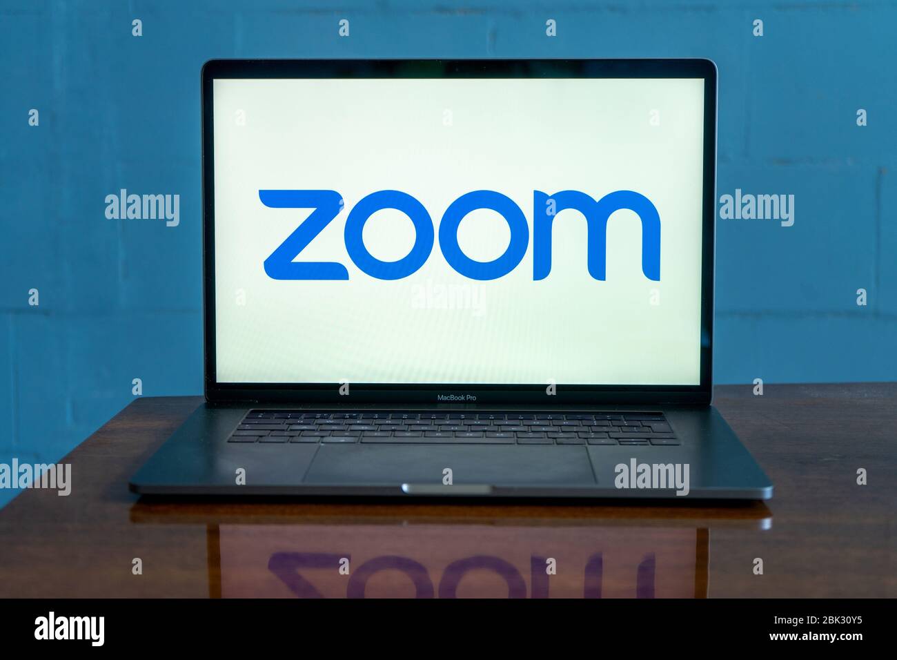 Laptop showing Zoom Cloud Meetings app logo. Work and have meetings from home Stock Photo Alamy
