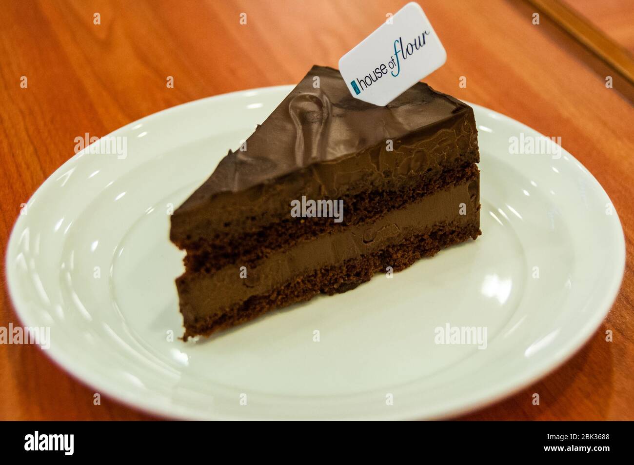 Hong Kong Plaza branch of House of Flour with their death by chocolate cake, Shanghai. Stock Photo