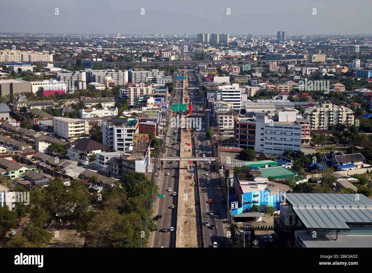 BANGKOK, THAILAND - JAN 1, 2019: Aerial photograph of Ramintra Road providing space for installation of columns for railway tracks of BTS Skytrain Pin Stock Photo
