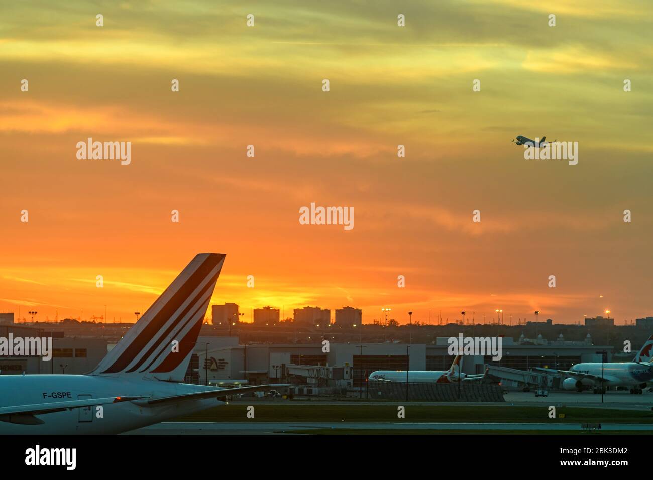 Aircraft taking off against an evening sky, Toronto, Ontario, Canada Stock Photo
