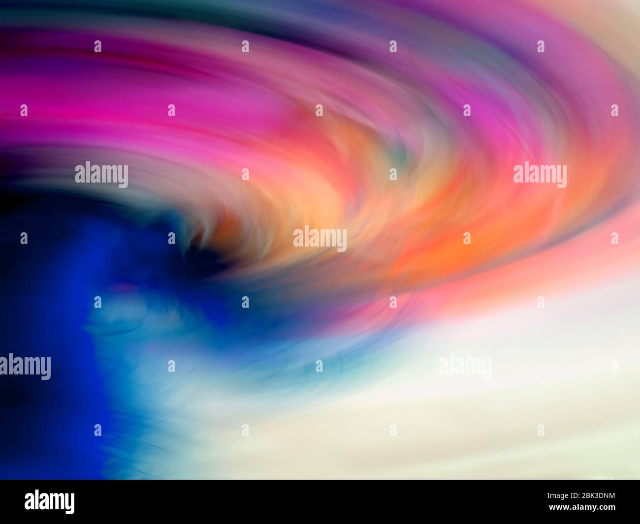 An Abstract Photo of a Tornado Showing the Funnel of the Vortex on a Colourful Background Stock Photo