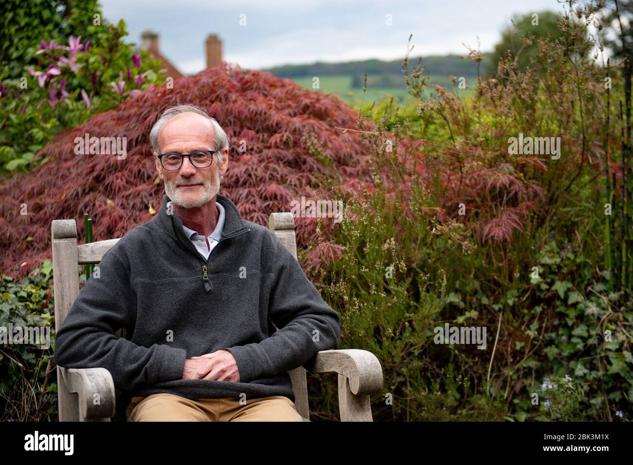 Relate counsellor Peter Saddington in his garden in Belper, Derbyshire. The relationship counsellor has urged couples struggling with lockdown to spend time apart in order to avoid living in a 'pressure cooker'. Stock Photo