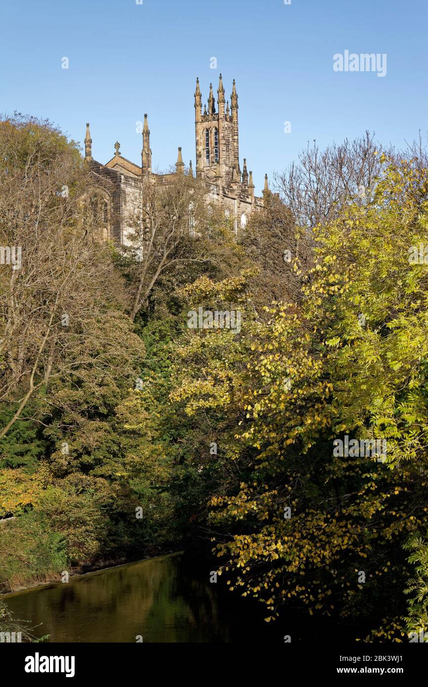 Holy Trinity Church alongside Dean Bridge which crosses the Water of Leith in Edinburgh seen from Dean Village near the city centre Stock Photo