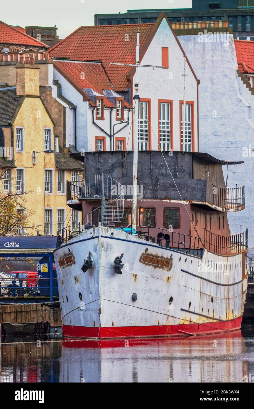Ocean Mist, a hundred year old minesweeper which became a luxury yacht, being converted to a floating hotel on the Water of Leith in Edinburgh Stock Photo