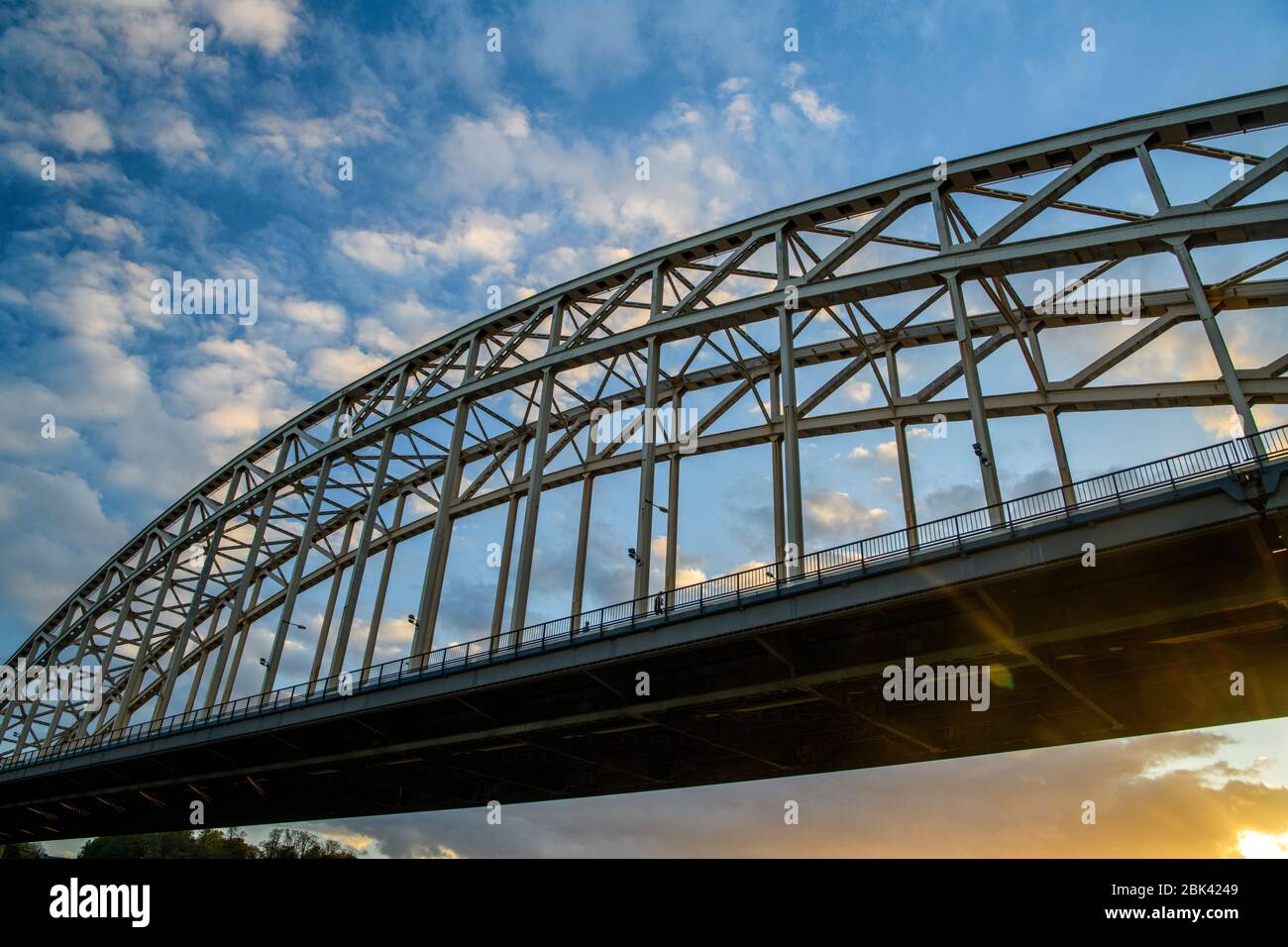 Waalbrug Bridge over the Waal River at sunset, Nijmegen, Gelderland, Netherlands Stock Photo