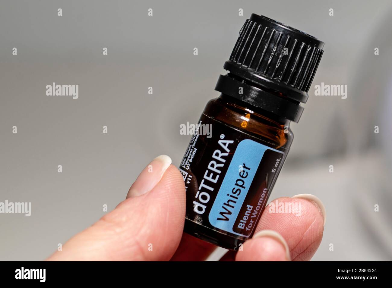 Banska Bystrica, Slovakia - December 29th 2019: High quality essential oil Whisper Doterra brand. Healthcare and wellbeing concept. Selective focus. Stock Photo