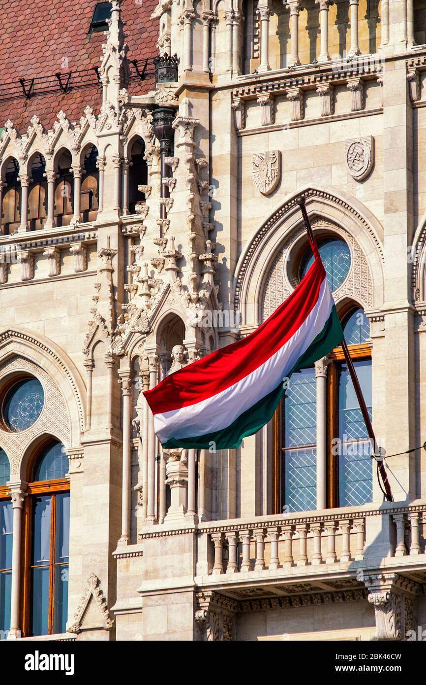 National flag of Hungary on the Hungarian Parliament Building, Orszaghaz in Budapest Stock Photo