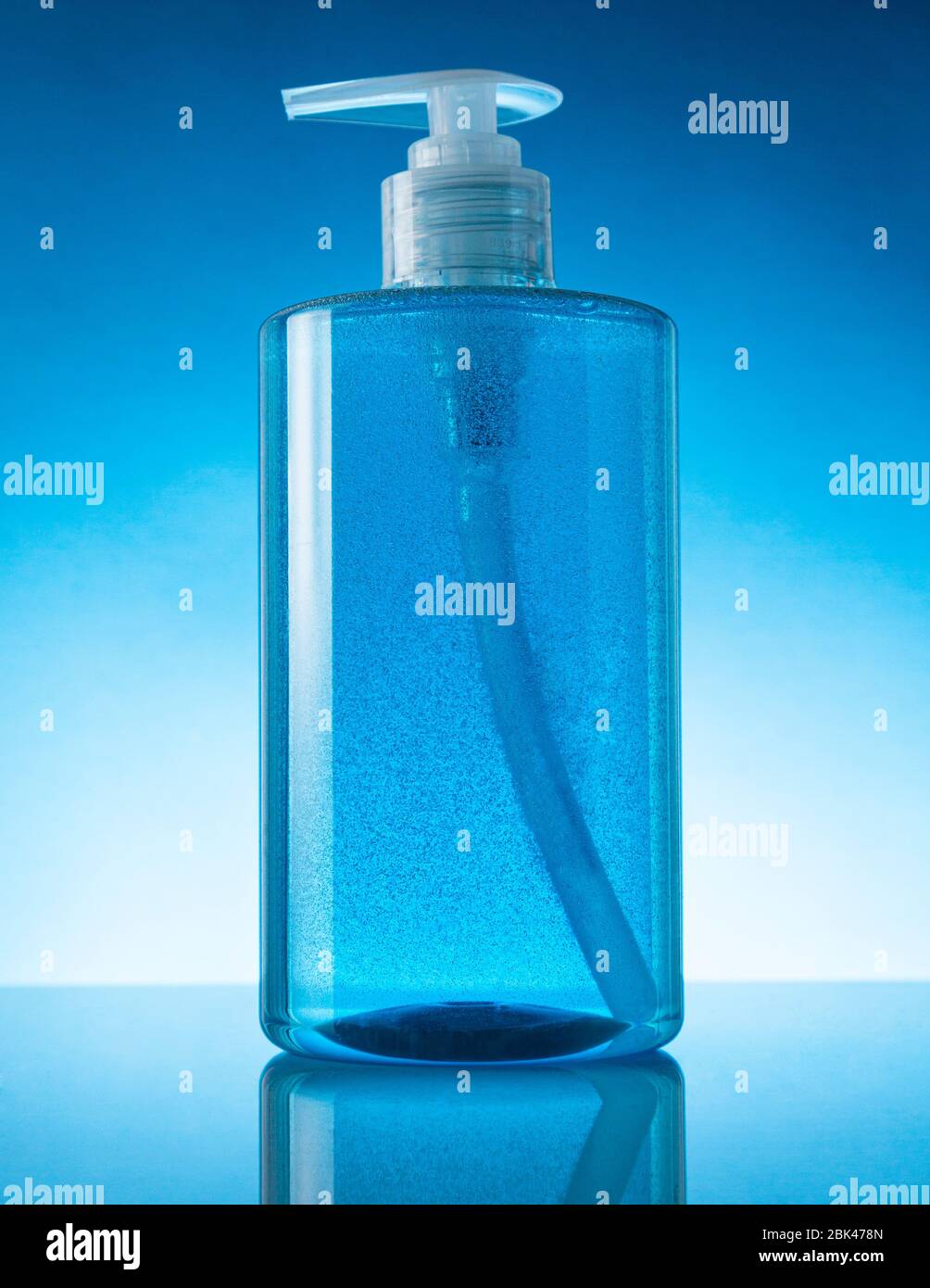 A blue bottle of antibacterial handwash, hand sanitizer alcohol in a