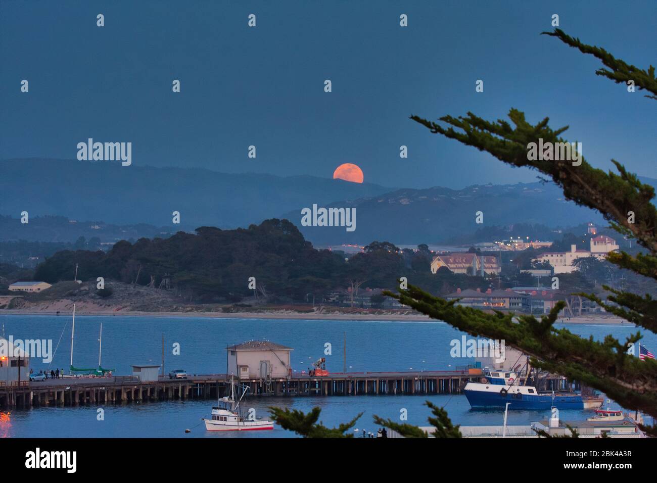 Supermoon rising over the Monterey Bay. Stock Photo