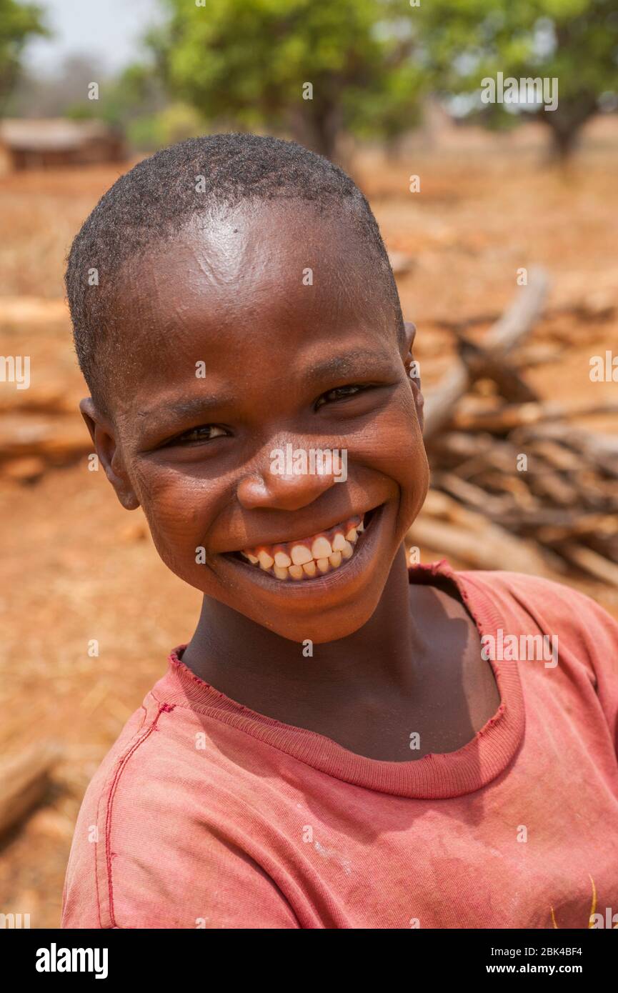 Portrait of a boy in Somba Land, Benin, with scarification, which is applied on the face when they are children and is an initiation and entry into th Stock Photo