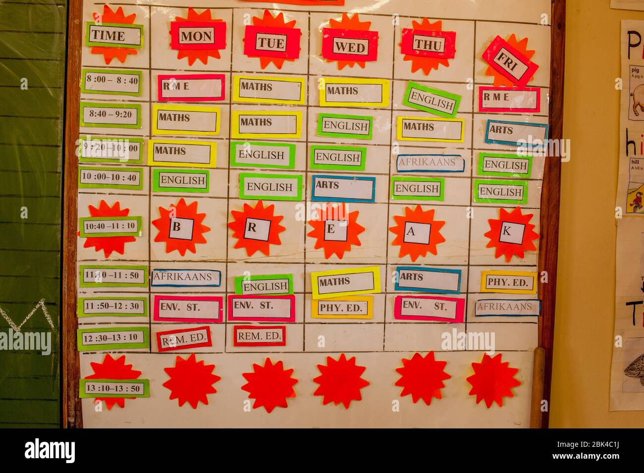 The class schedule posted inside a first grade classroom of a primary ...