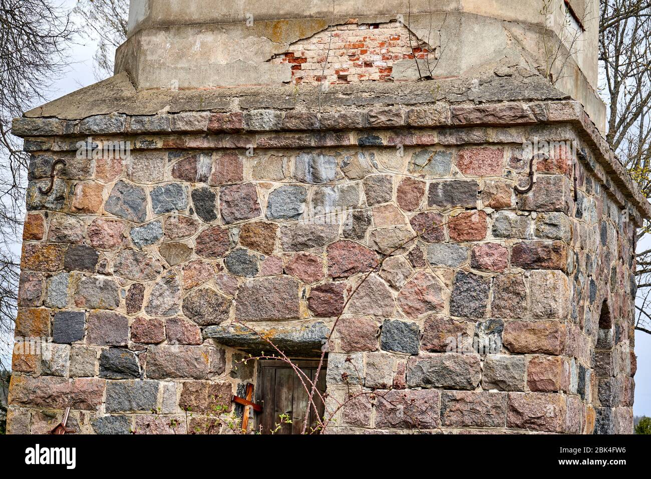Old stone wall with doors and window Stock Photo