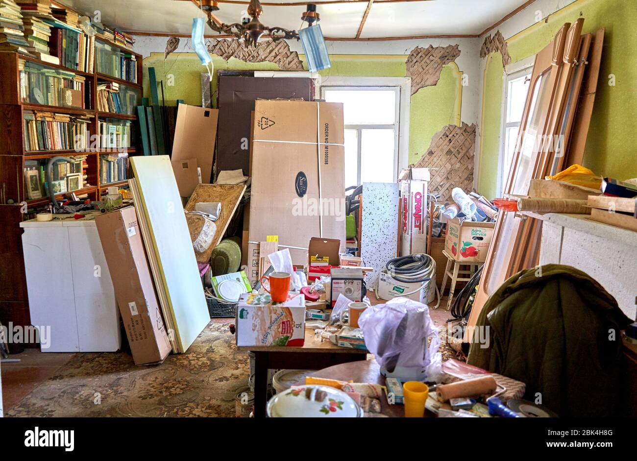 Room in old house full of stuff Stock Photo - Alamy