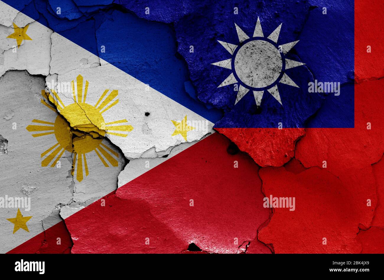 flags of Philippines and Taiwan painted on cracked wall Stock Photo