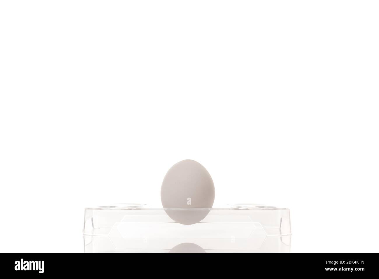 https://c8.alamy.com/comp/2BK4KTN/chicken-egg-in-plastic-holder-isolated-on-white-background-2BK4KTN.jpg