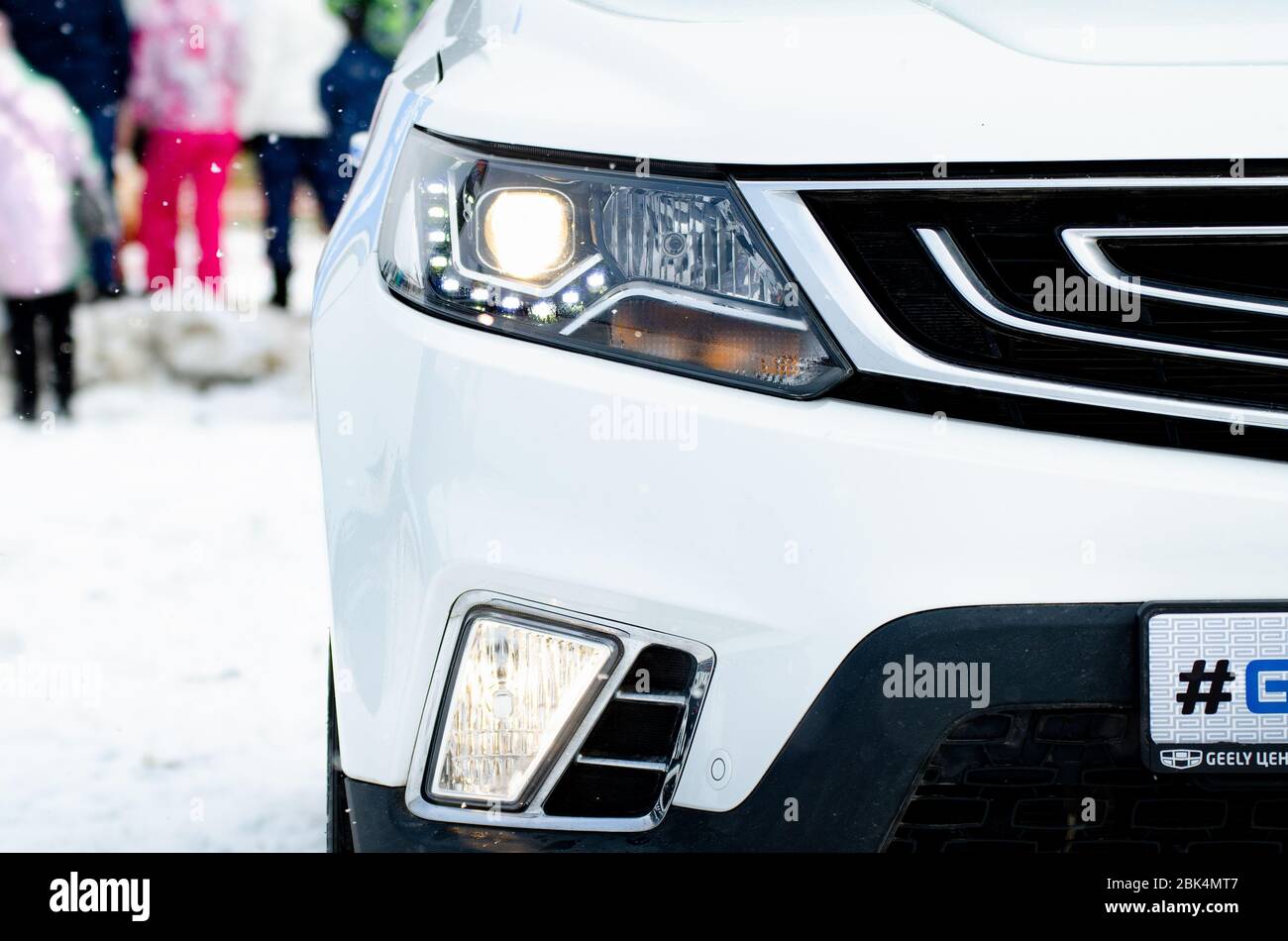 VOLOGDA, RUSSIA - FEBRUARY 28, 2020: The headlights and the hood of a new Geely car Stock Photo