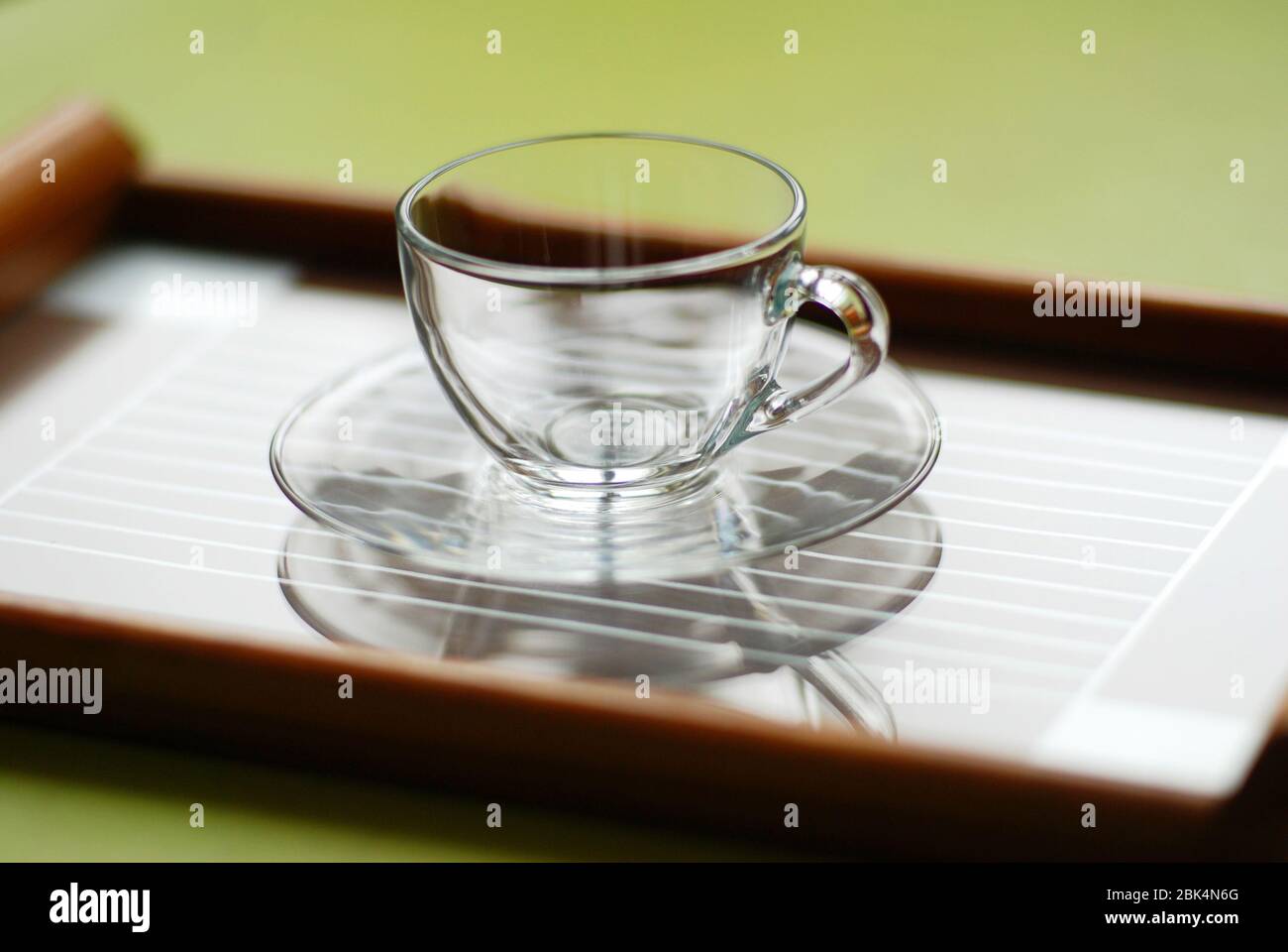 Empty tea glas on a vintage tablet Stock Photo