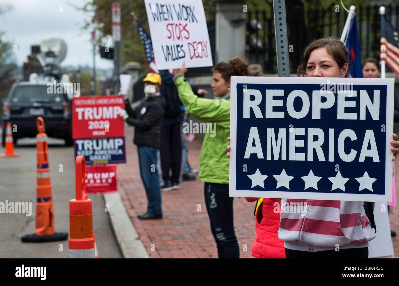 Boston, MA, USA, 01 May 2020.  Less than 50 pro U.S. President Trump demonstrators took part in a rally to reopen Massachusetts in front of the Massachusetts State House in central Boston on the same day that Massachusetts governor Charlie Baker made wearing a face covering or mask mandatory in public.  Baker also extended his states stay-at-home order until May 18th.                                                    Credit: Chuck Nacke / Alamy Live News Stock Photo