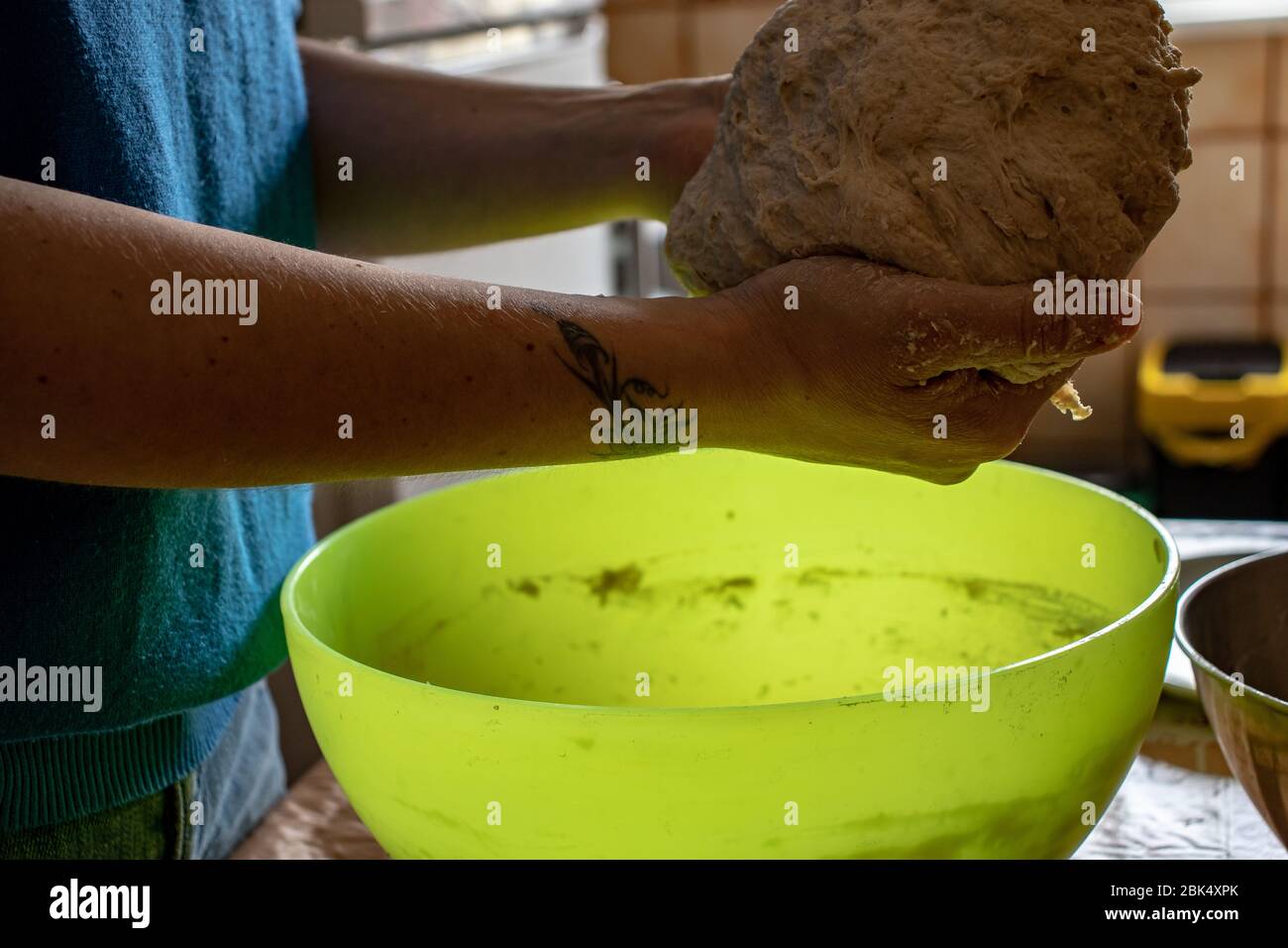 Rome, knead the pizza at home, a soft and slow rising dough. Stock Photo