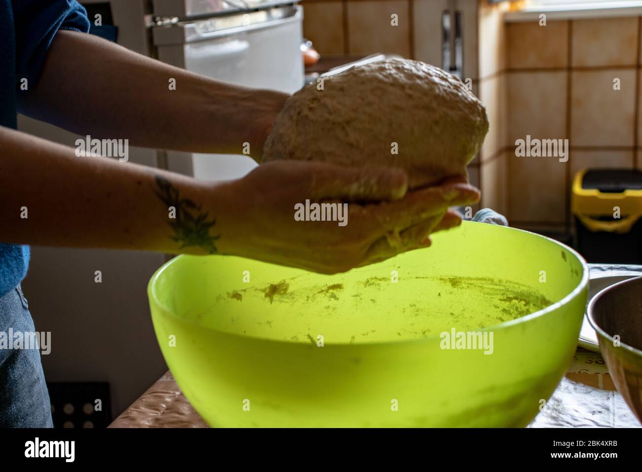 Rome, knead the pizza at home, a soft and slow rising dough. Stock Photo