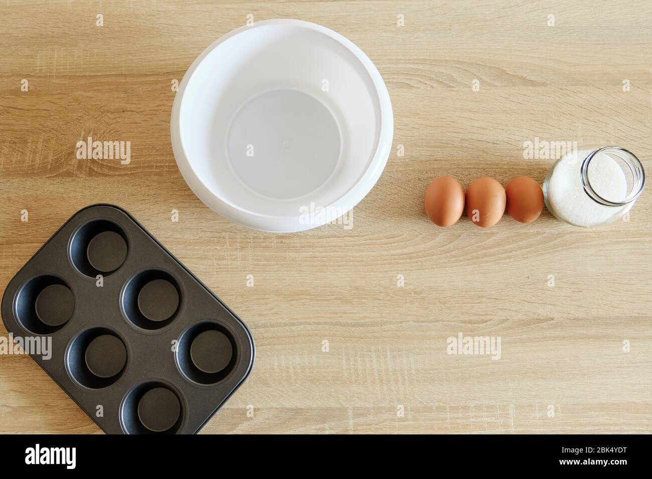 cookware with baking ingredients plates and shapes waiting to cooked Stock Photo