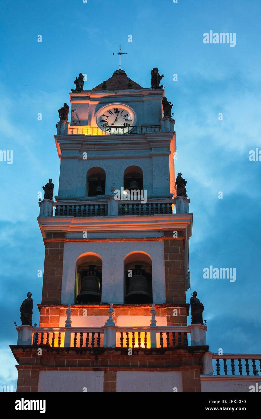 Illuminated tower at sunset of Sucre Cathedral, Bolivia Stock Photo