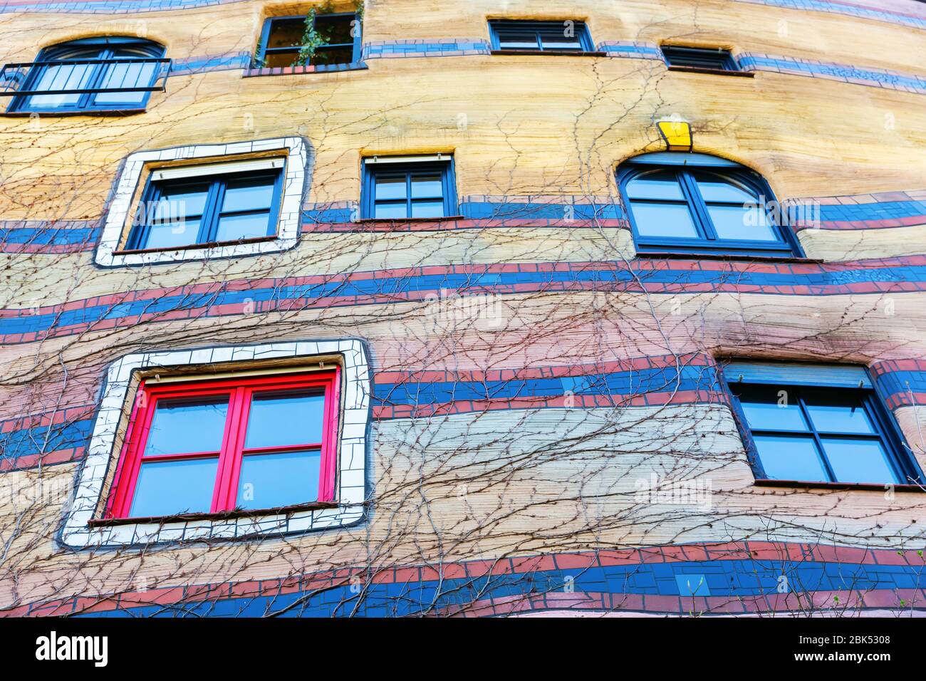 Darmstadt, Germany April 08, 2018: facade detail of the Waldspirale building in Darmstadt. It was designed by Friedensreich Hundertwasser, completed 2 Stock Photo