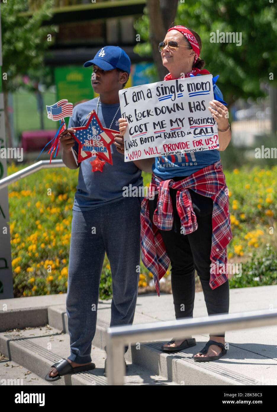 Demonstrators protesting stay at home order at City Hall, Los Angeles, California, on May 1st, 2020. Stock Photo