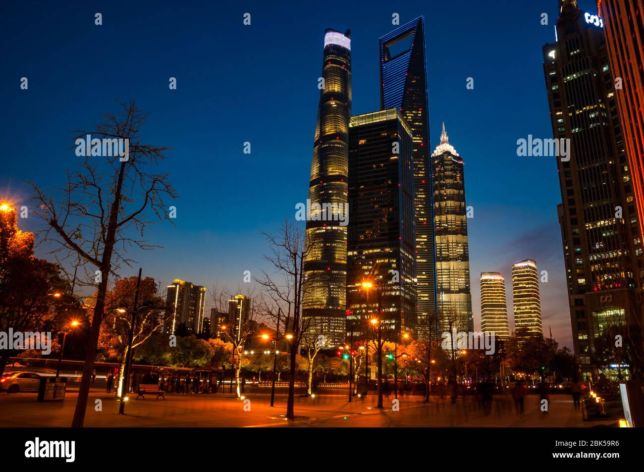 The Shanghai Tower, Jinmao Tower and Shanghai World Financial Center skyscrapers seen at during the blue hour (evening) from around Dongchang Road sub Stock Photo