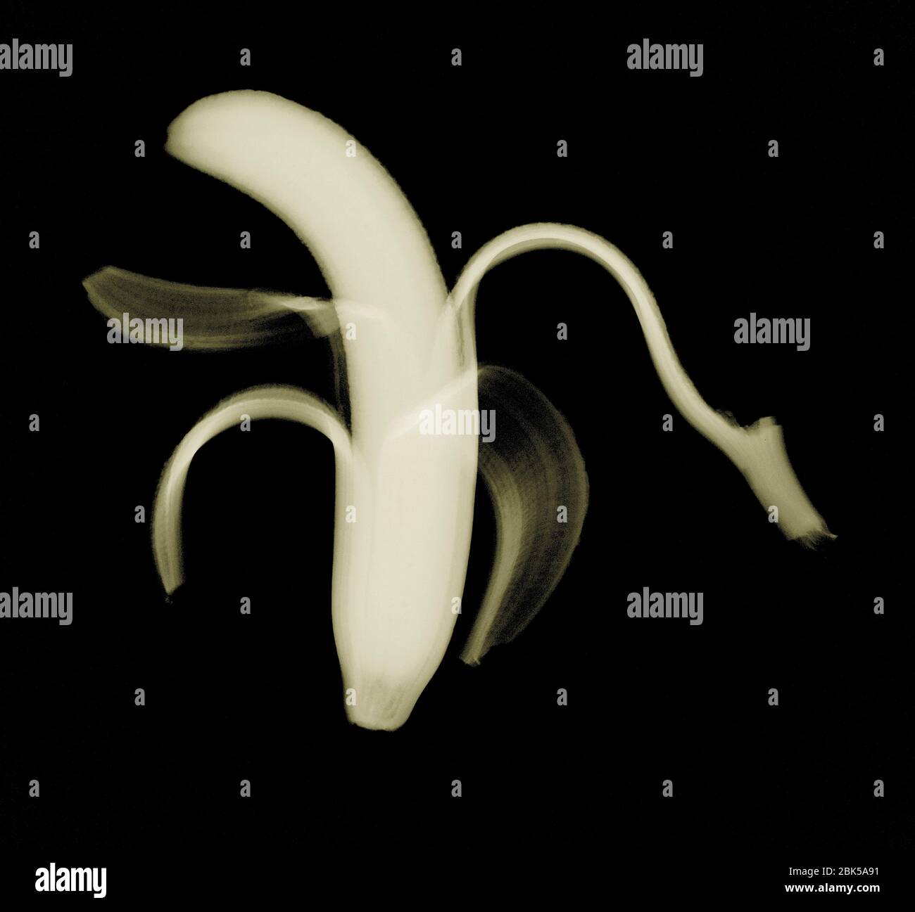 Peeled banana, coloured X-ray. Stock Photo