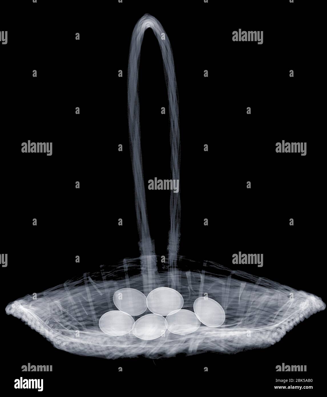 Wicker basket carrying or holding eggs, X-ray. Stock Photo