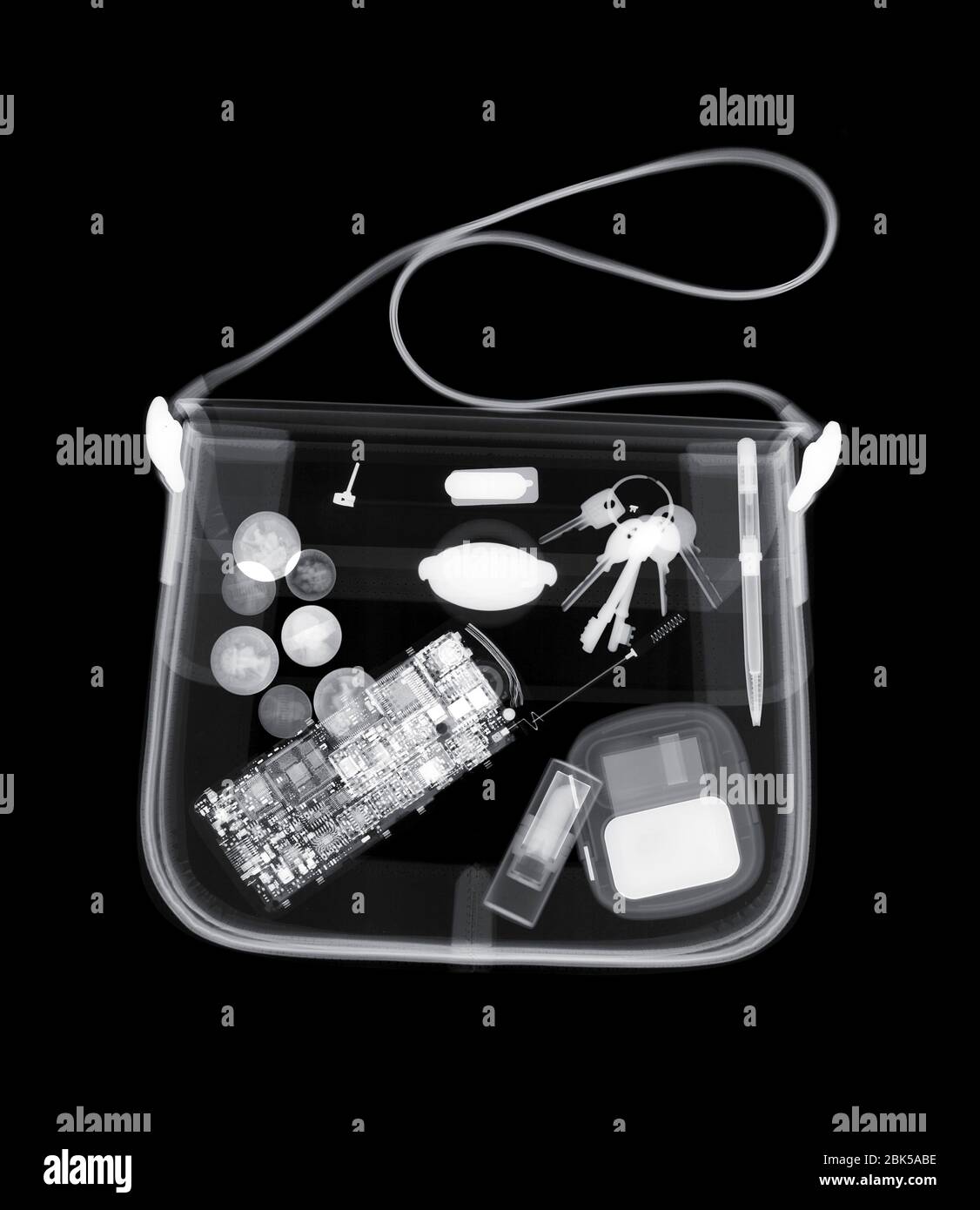 Handbag with various items, X-ray. Stock Photo