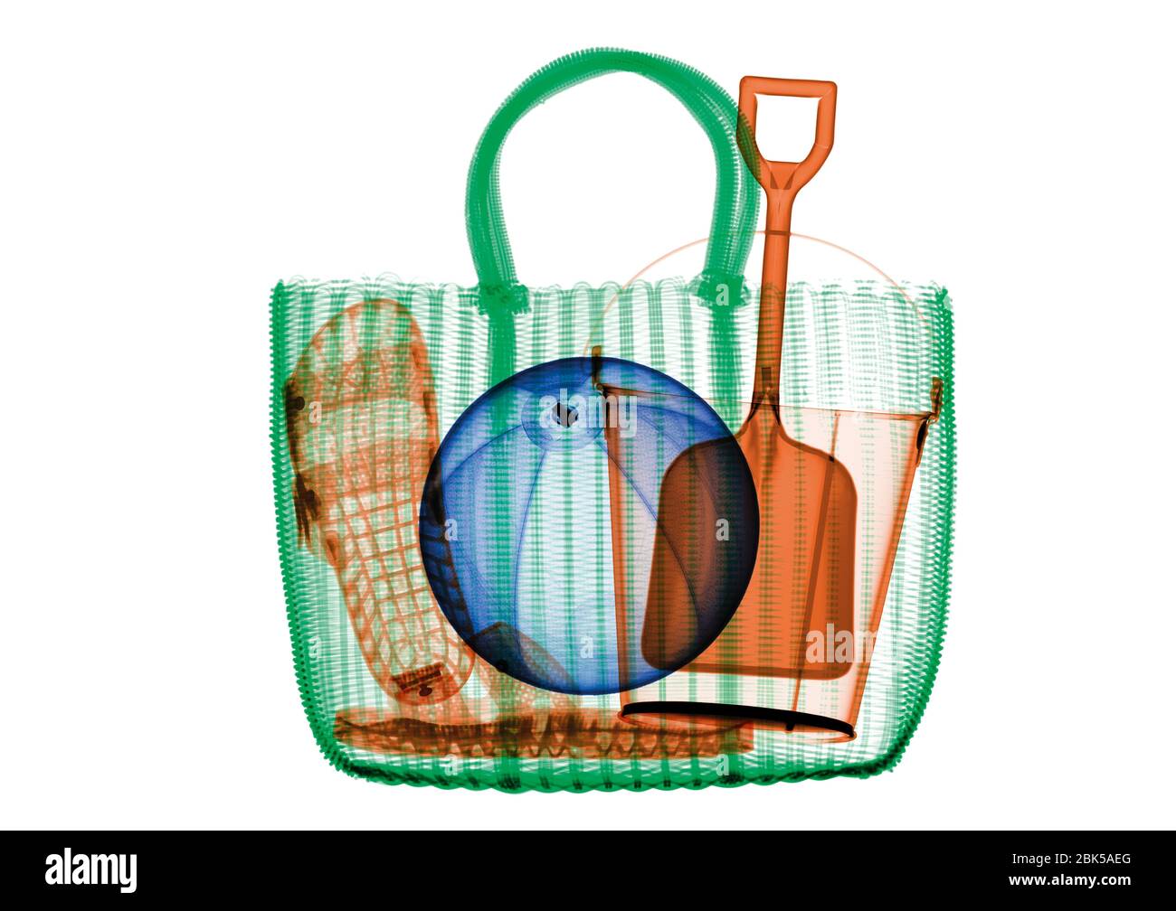 Woven beach bag with beach toys and sandals, coloured X-ray. Stock Photo