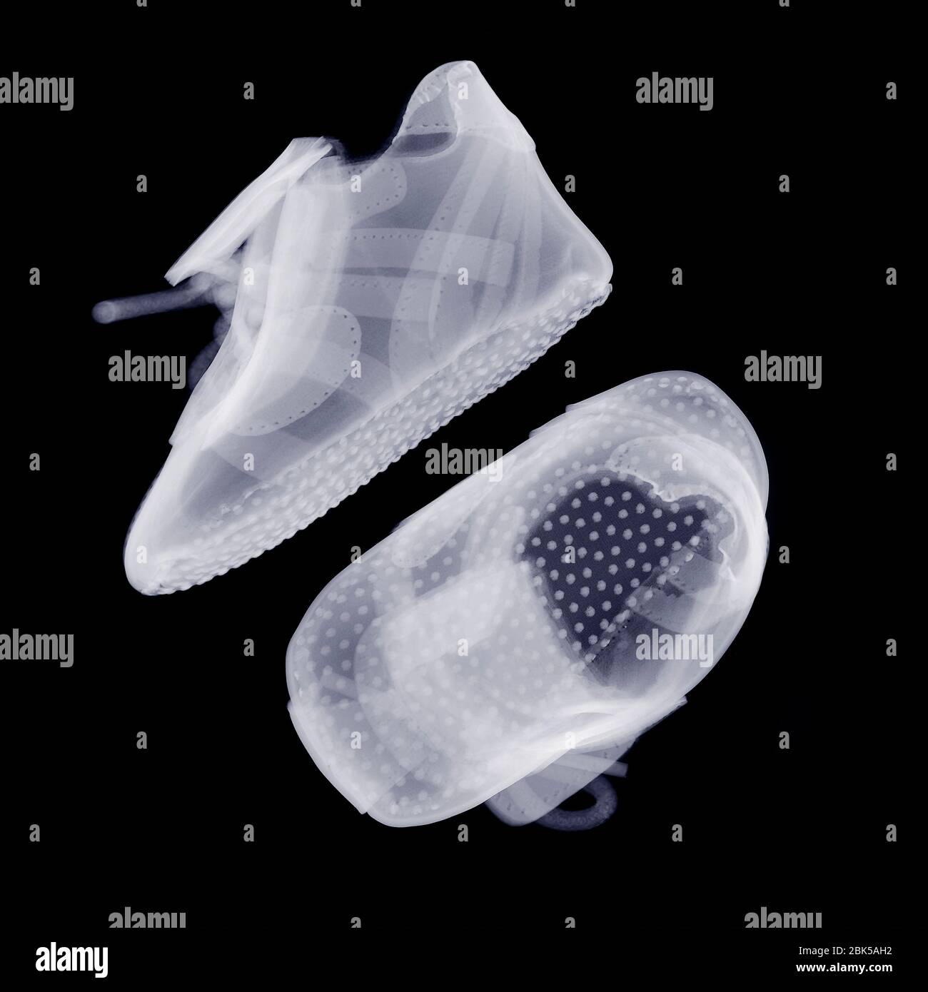 Baby shoes, X-ray. Stock Photo