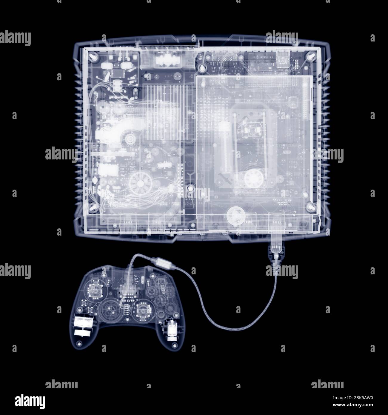 Games console and joy pad, X-ray. Stock Photo