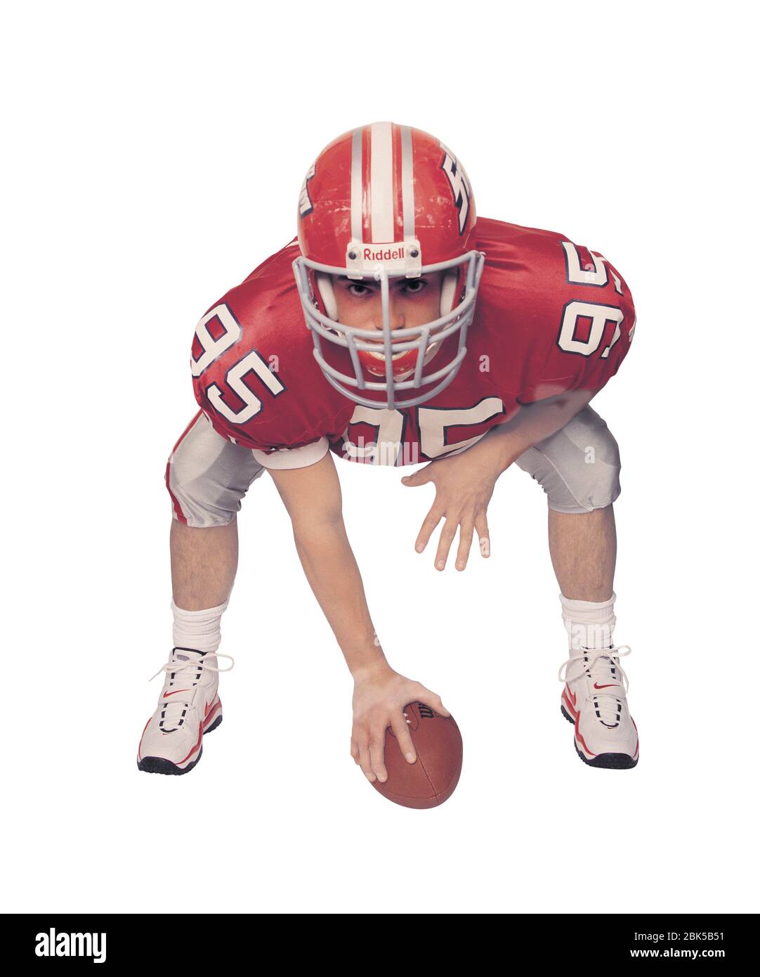 American football player, coloured X-ray. Stock Photo