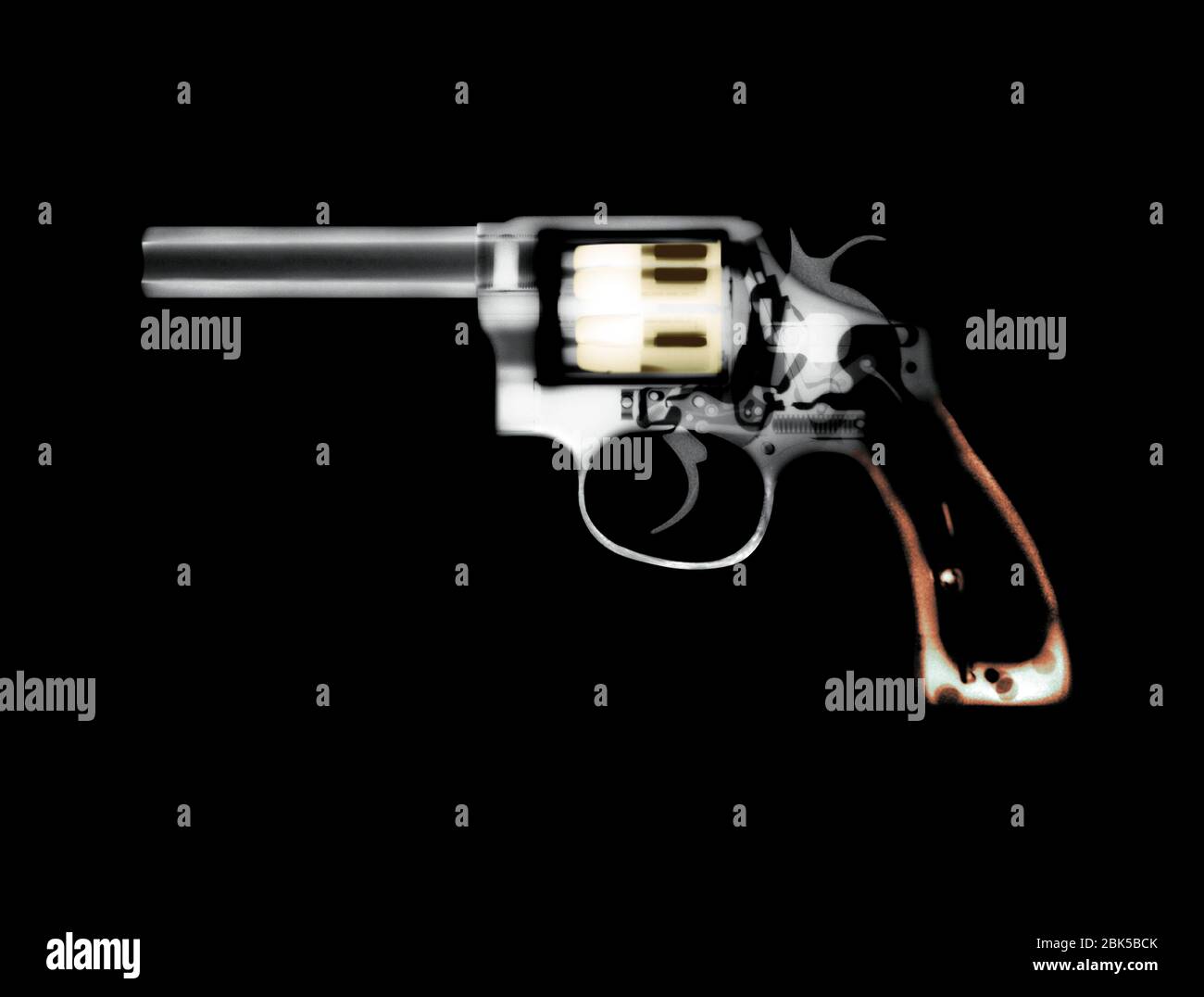 Revolver, coloured X-ray. Stock Photo