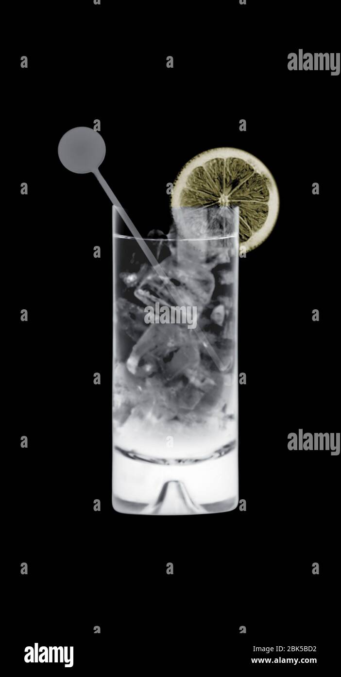 Cocktail in a straight glass, coloured X-ray. Stock Photo