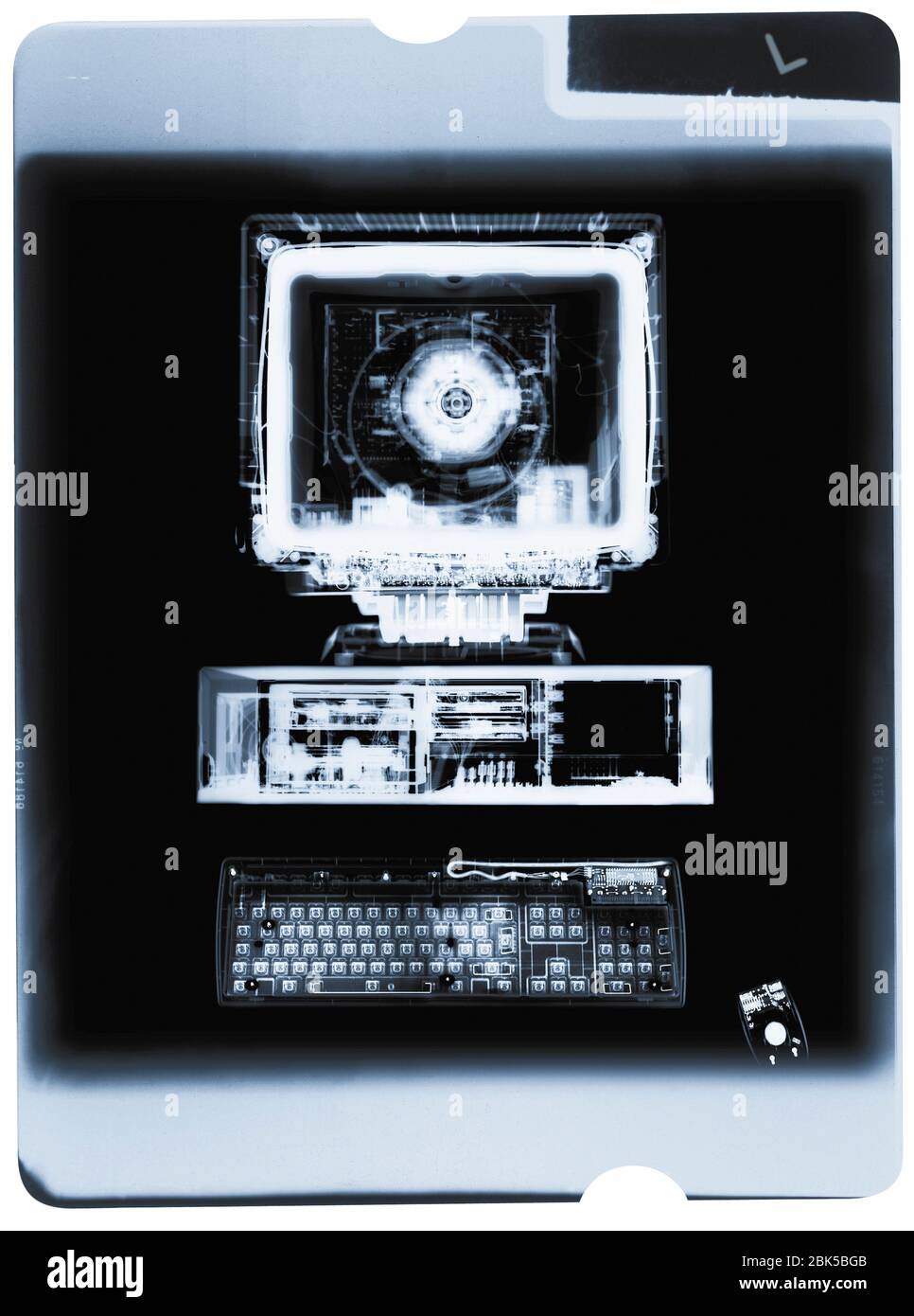 Film of personal computer and keyboard, X-ray. Stock Photo
