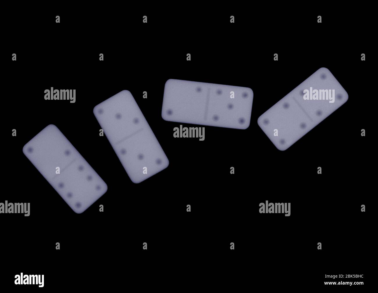 Four dominos, X-ray. Stock Photo