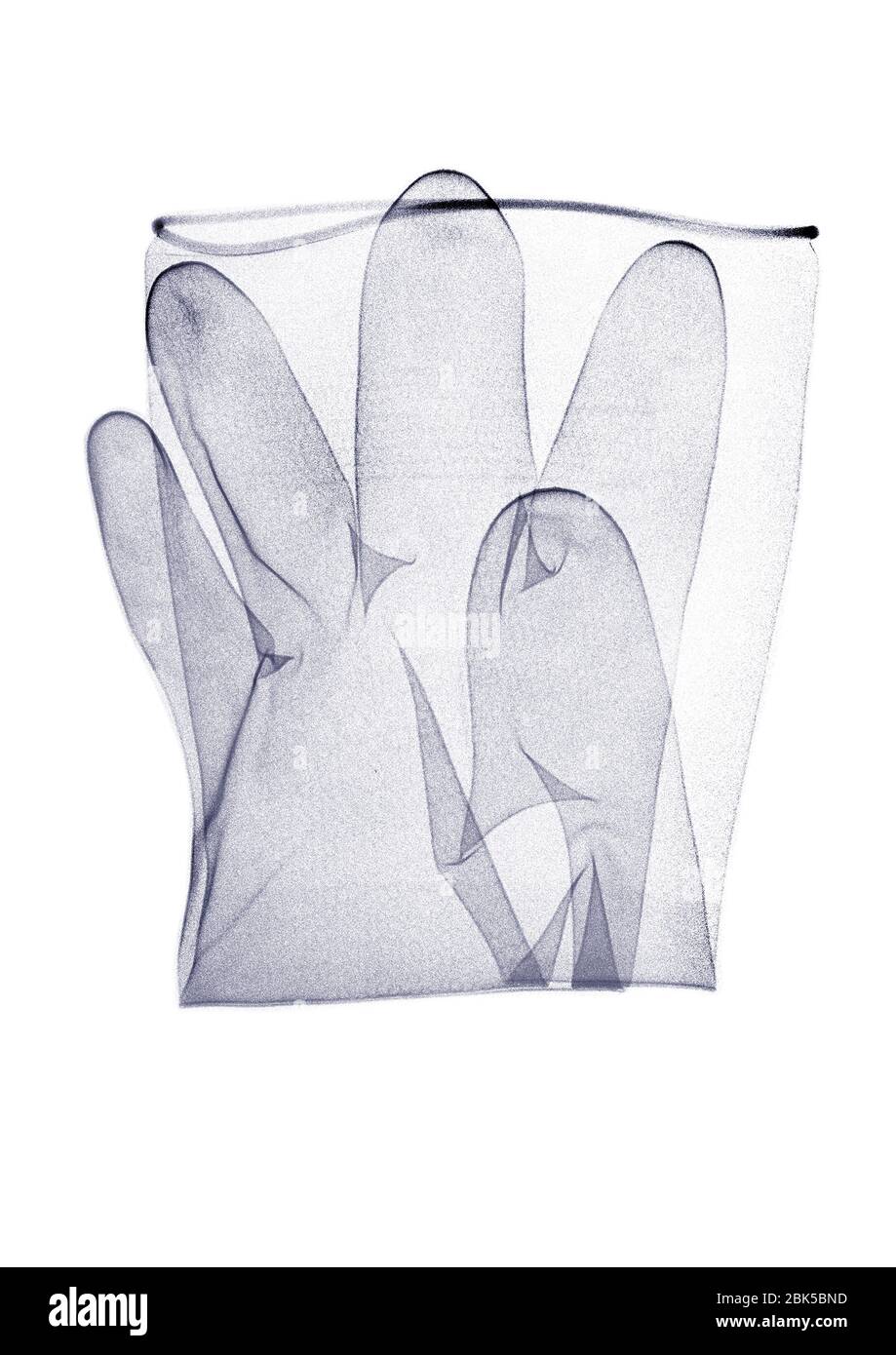 Folded disposable glove, X-ray. Stock Photo