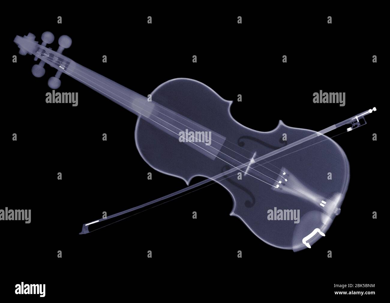Violin and bow, X-ray. Stock Photo
