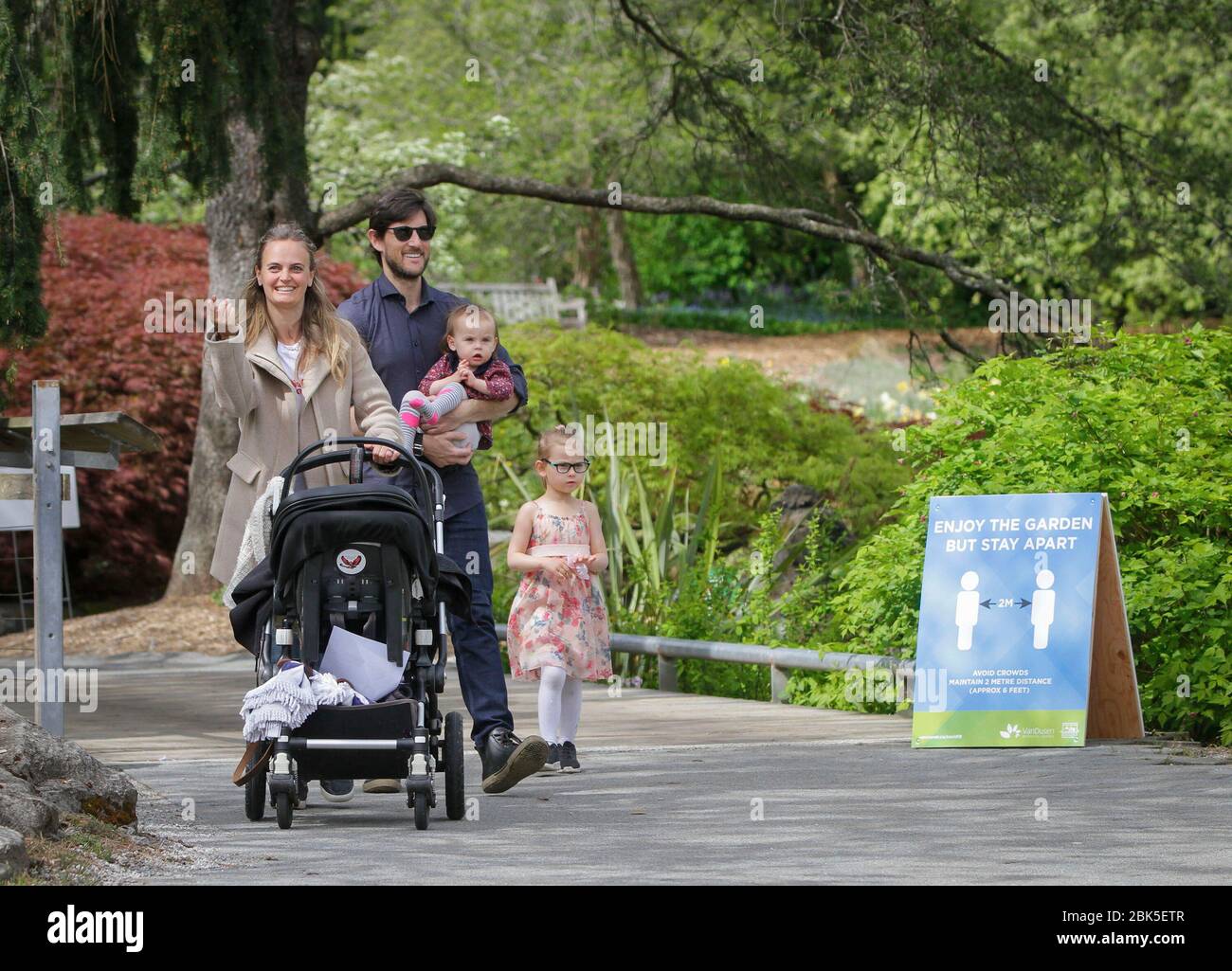 Vancouver, Canada. 1st May, 2020. A family visits the reopened VanDusen Botanical Garden in Vancouver, Canada, on May 1, 2020. Vancouver started on Friday to gradually reopen public recreation facilities with safety measures amid COVID-9 pandemic. Credit: Liang Sen/Xinhua/Alamy Live News Stock Photo