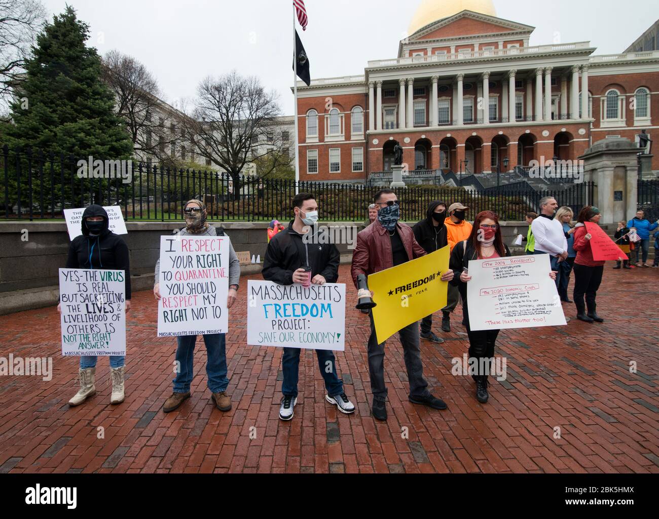 Boston, MA, USA, 01 May 2020.  Less than 50 pro U.S. President Trump demonstrators took part in a rally to reopen Massachusetts in front of the Massachusetts State House in central Boston on the same day that Massachusetts governor Charlie Baker made wearing a face covering or mask mandatory in public.  Baker also extended his states stay-at-home order until May 18th. Stock Photo