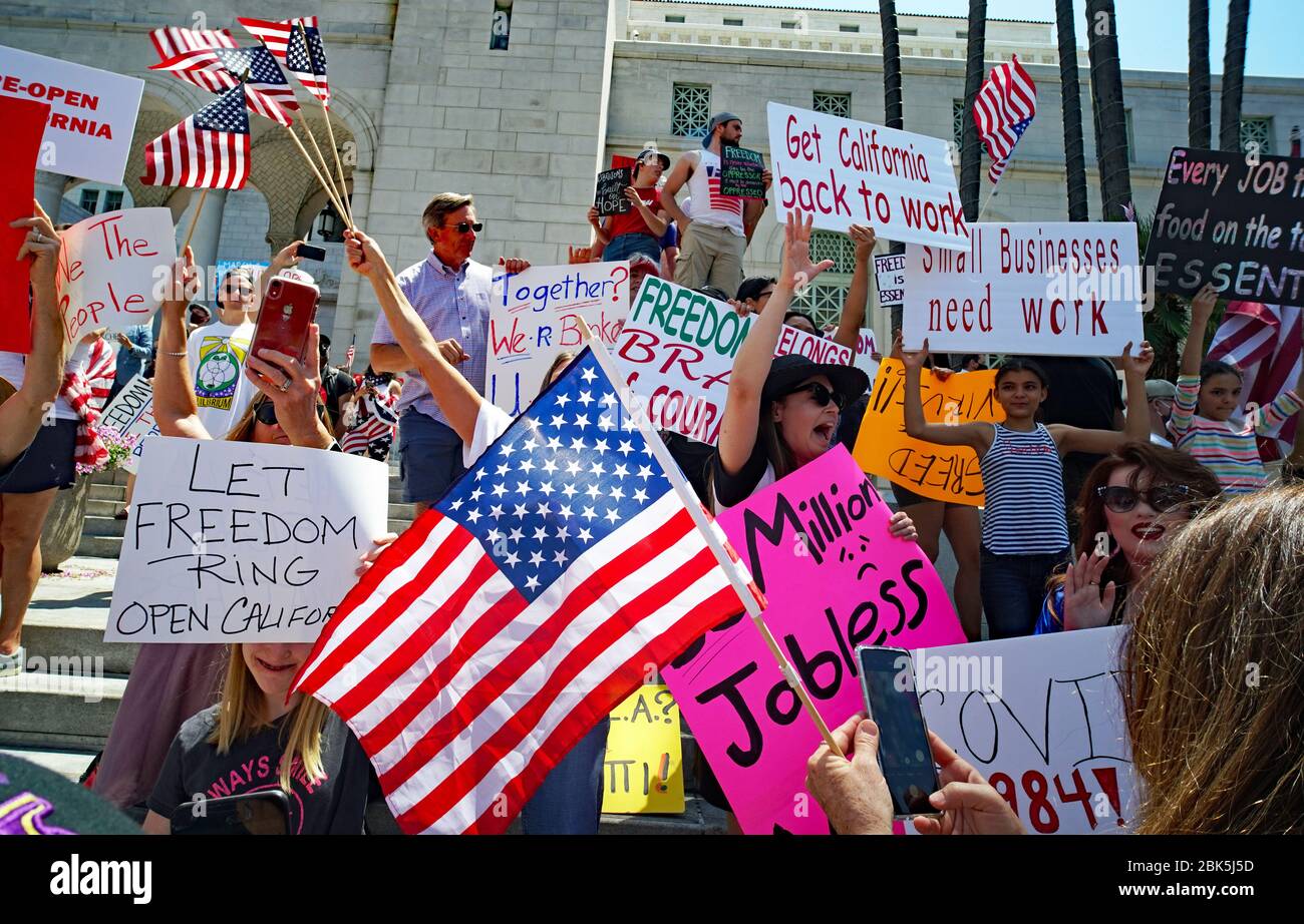 FULLYOPENCA May 1, 2020 Los Angeles, Ca. Hundreds gathers in front of Los Angeles City Hall protesting Stay At Home, displaying Signs no more shutdown, open our churches Stock Photo